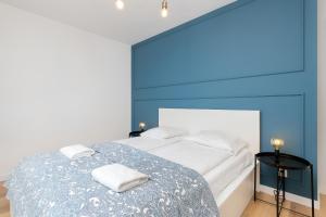Postel nebo postele na pokoji v ubytování Apartamenty Letnicka by Noclegi Renters