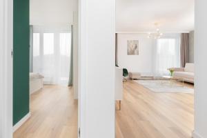 Postel nebo postele na pokoji v ubytování Apartamenty Letnicka by Noclegi Renters
