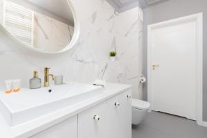 Koupelna v ubytování Apartamenty Letnicka by Noclegi Renters
