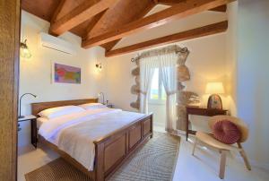 Posteľ alebo postele v izbe v ubytovaní Villa Margaret + 29 fotografií