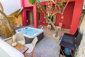 a hot tub in the backyard of a house at iole boutique house in Nafplio