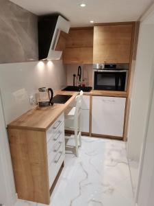 Kuchyňa alebo kuchynka v ubytovaní Apartament Strzyza Castle - Definicja Luksusu