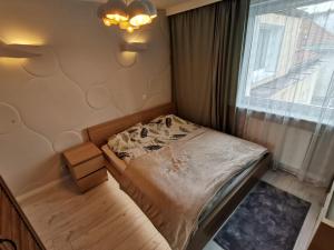 Кровать или кровати в номере Apartament Strzyza Castle - Definicja Luksusu