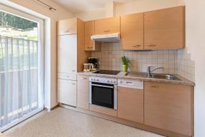 Kuchyň nebo kuchyňský kout v ubytování Ferienwohnung Helena