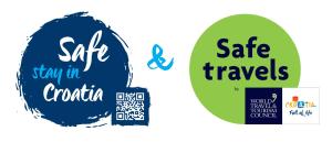 two stickers with the text safe travels and stay in croatia and world travel at Apartments Stasic in Vrbnik