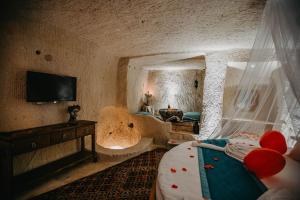 A television and/or entertainment centre at Prime Cappadocia Suites