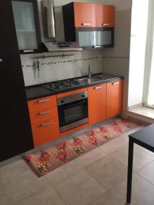 Kuchyňa alebo kuchynka v ubytovaní APPARTAMENTO CORSO VITTORIO EMANUELE + 31 fotografií