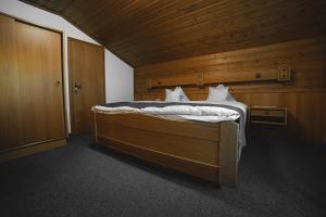 Voodi või voodid majutusasutuse Hotel Landhaus Neumayr toas