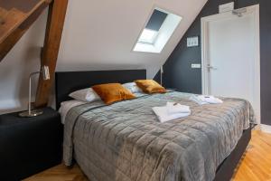 Postel nebo postele na pokoji v ubytování Stadslogement Hoogend