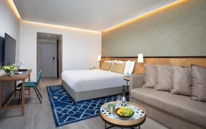Postel nebo postele na pokoji v ubytování Vert Hotel Eilat by AFI Hotels
