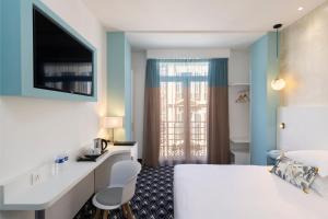 Postel nebo postele na pokoji v ubytování Hôtel Byakko Nice