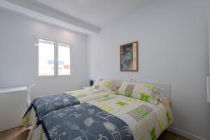 A bed or beds in a room at Benecharo By CanariasGetaway