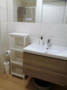 Kúpeľňa v ubytovaní Apartament nad morzem KOŁO BRZEGU + 7 fotografií