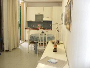 A kitchen or kitchenette at Punta Ala Flat