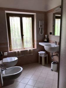 Koupelna v ubytování Albergo Ristorante Belvedere