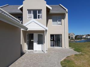 a rendering of a house with a driveway at The Holy Hill Royal Alfred Marina in Port Alfred