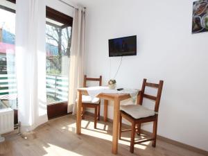 TV a/nebo společenská místnost v ubytování Apartment Liebl-4 by Interhome