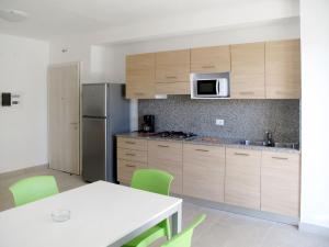 Η κουζίνα ή μικρή κουζίνα στο Apartment Fiore-1 by Interhome