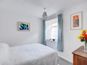Ένα ή περισσότερα κρεβάτια σε δωμάτιο στο Apartment St Andrews Court by Interhome