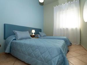 Cama ou camas em um quarto em Apartment Barbara-3 by Interhome