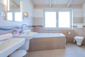 Koupelna v ubytování Ferienhaus Strandflieder