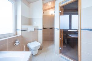 Koupelna v ubytování Ferienhaus Strandflieder
