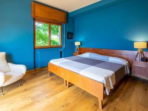 A bed or beds in a room at Villa Bice by Interhome