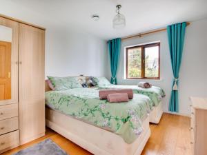 Ένα ή περισσότερα κρεβάτια σε δωμάτιο στο Holiday Home Greenbank by Interhome