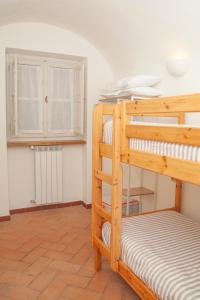 Krevet ili kreveti na kat u jedinici u objektu La Corte di Lisa - Self check-in