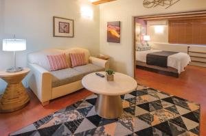 a living room with a couch and a bed at WorldMark Santa Fe in Santa Fe