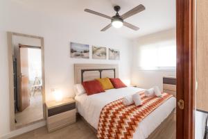 Postel nebo postele na pokoji v ubytování Moonkey - Apartamento Las Mandarinas + 23 fotografií