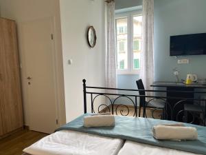 Postel nebo postele na pokoji v ubytování Rooms Lucia