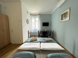 Postel nebo postele na pokoji v ubytování Rooms Lucia