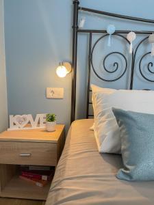 Postel nebo postele na pokoji v ubytování Rooms Lucia