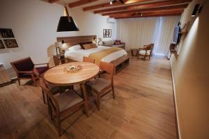 Postel nebo postele na pokoji v ubytování AWKA Apart Hotel + 37 fotografií