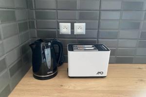 Tetera y cafetera en « L’escale »