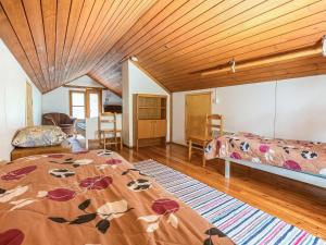 Katil atau katil-katil dalam bilik di Holiday Home Kesämäki by Interhome