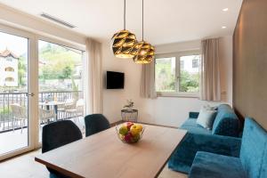 TV a/nebo společenská místnost v ubytování Marlingsuites