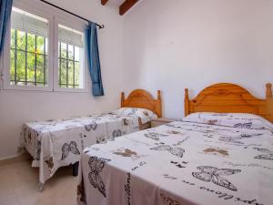 Posteľ alebo postele v izbe v ubytovaní Holiday Home Villa Jana by Interhome