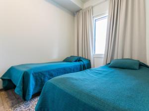 Postel nebo postele na pokoji v ubytování Holiday Home Skivillas 61 ukkohalla - b10 by Interhome