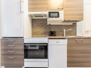 Kuchyň nebo kuchyňský kout v ubytování Holiday Home Skivillas 61 ukkohalla - b8 by Interhome + 9 fotografií