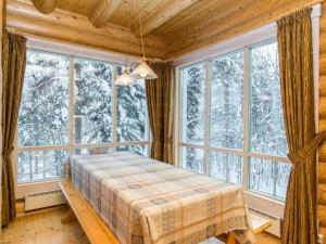 Postel nebo postele na pokoji v ubytování Holiday Home Hallantähti cottage by Interhome