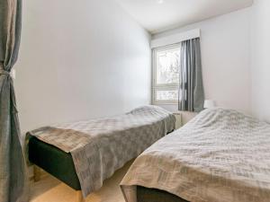 Postel nebo postele na pokoji v ubytování Holiday Home Kotipaljakka b6 by Interhome