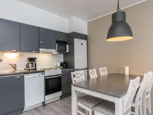 Kuchyň nebo kuchyňský kout v ubytování Holiday Home Skivillas paljakka 3- - 2 bedrooms by Interhome + 8 fotografií