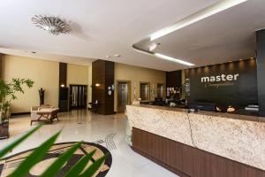 The lobby or reception area at Master Cosmopolitan Moinhos de Vento