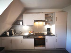 Dapur atau dapur kecil di Idyllisches Reethaus Tönning +6 gambar