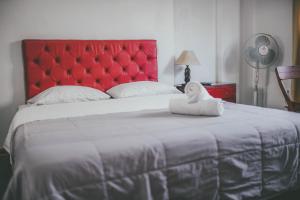 Ένα ή περισσότερα κρεβάτια σε δωμάτιο στο Hotel Excalibur