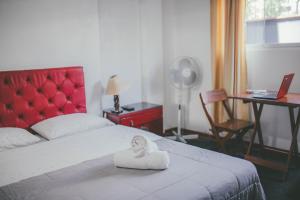 Ένα ή περισσότερα κρεβάτια σε δωμάτιο στο Hotel Excalibur