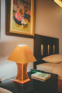 Ένα ή περισσότερα κρεβάτια σε δωμάτιο στο Hotel Excalibur