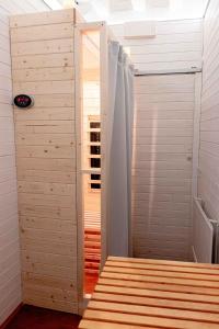 a room with a sauna with a wooden floor at La Perla del Doge con Wellness & Spa uso esclusivo in Venice